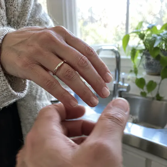 The ring goes right over the knuckle